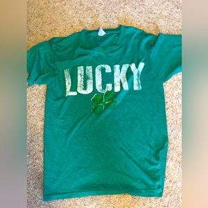 Green lucky shirt with shamrock on it